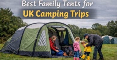 Family tent with living area set up on a UK campsite for a weekend camping trip with children