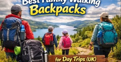 Family walking along a scenic UK trail wearing backpacks during a day trip