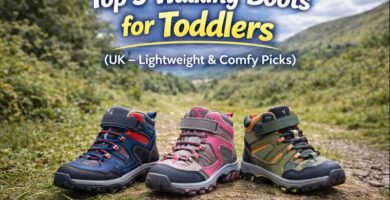 Three pairs of toddler walking boots on a countryside path for a UK family walking guide