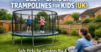 Children jumping on a large enclosed trampoline in a typical UK family garden