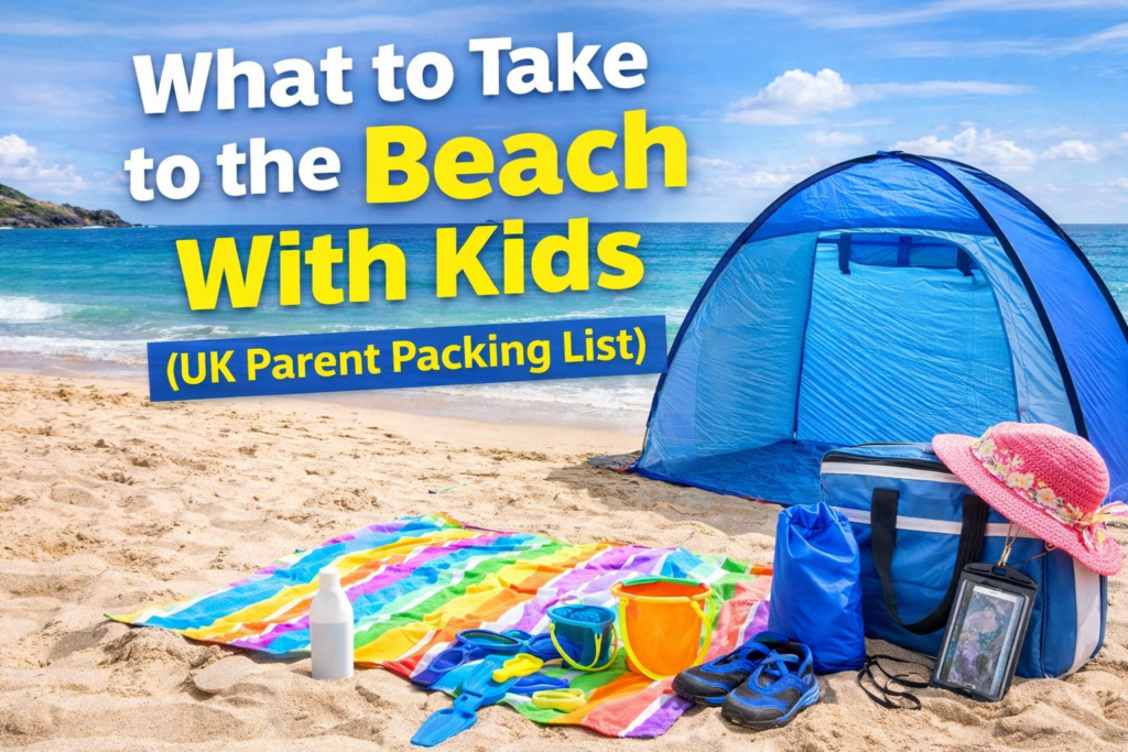 Beach shelter, towel, kids toys, dry bag and essentials laid out on a UK beach for a family packing guide